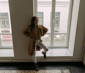 Silhouette of a person in a balancing pose.